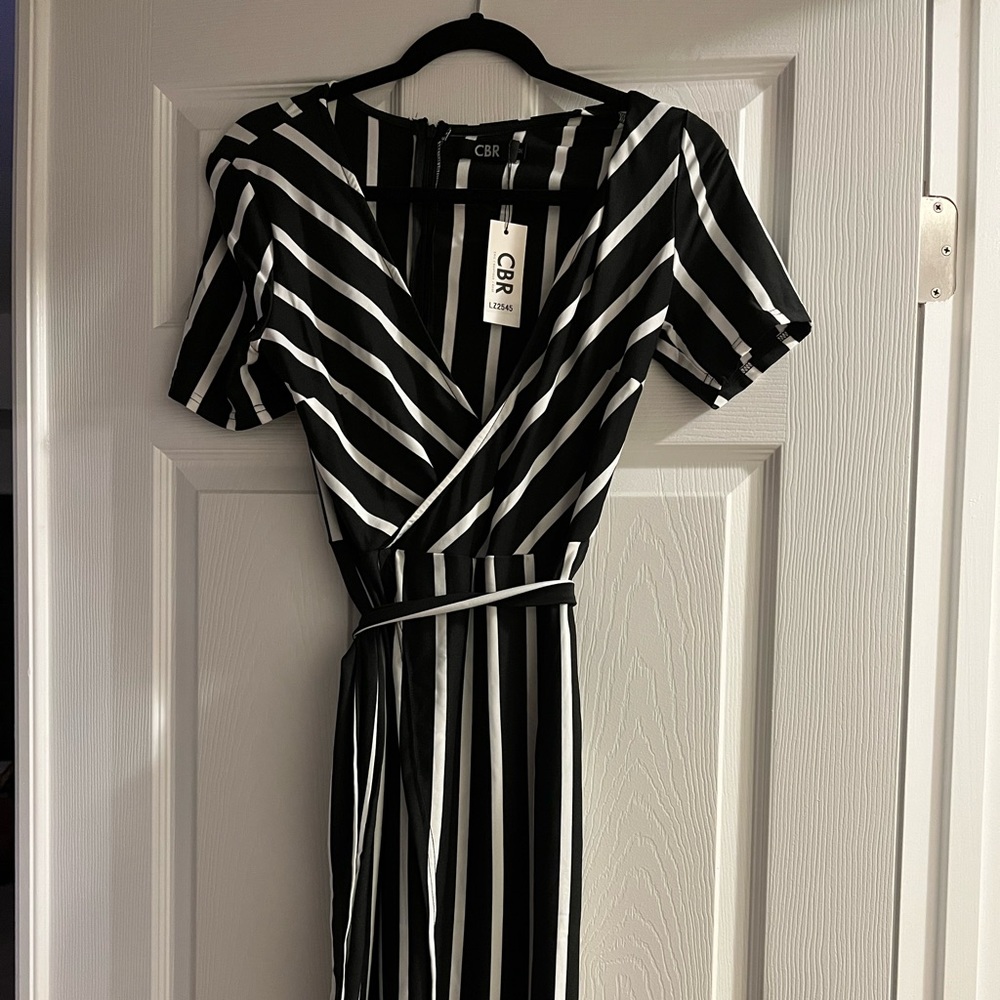 Black and white maxi dress with waist tie.